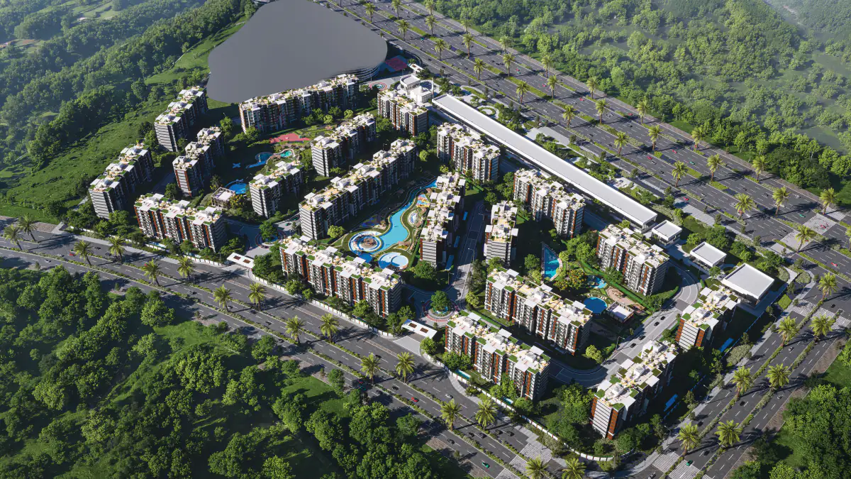 تصوّر من فوق للمخطط العام لـAyyam Residence: عمارات وسط الحدائق والبحيرات
